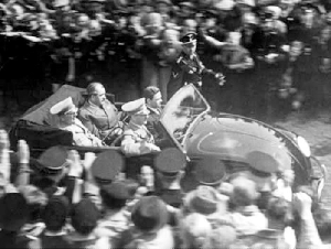 Ferry Porsche driving Hitler at the cornerstone ceremony